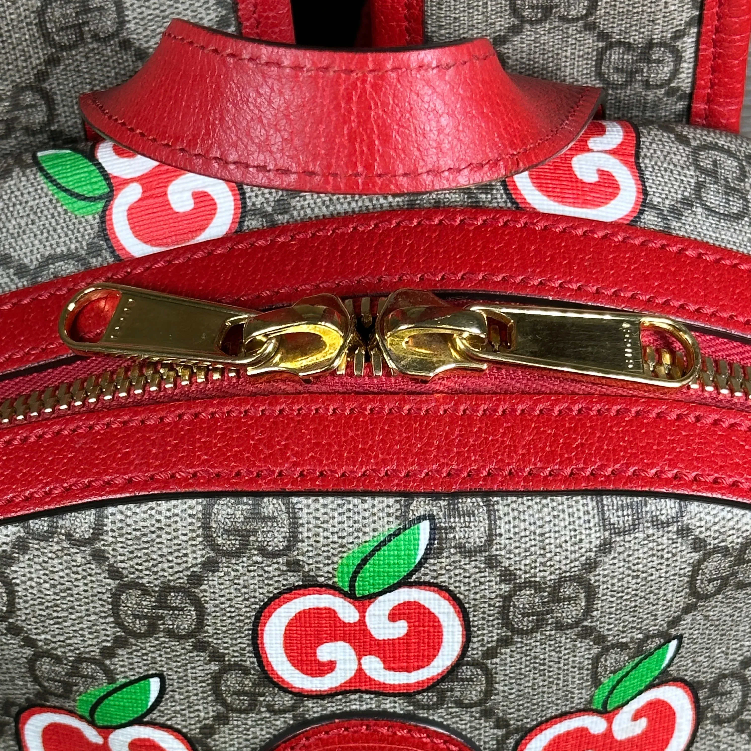 Gucci GG Supreme Canvas Interlocking Apple Backpack